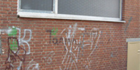 House facade before the removal of graffiti